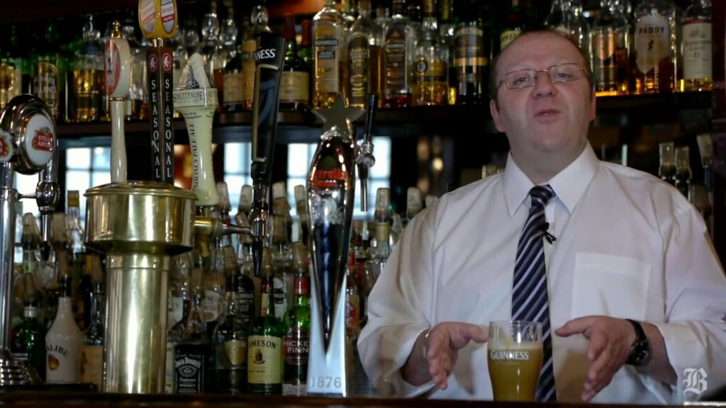 Bartender looking at the camera.